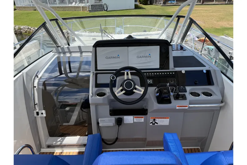 Slide: The Image of Cockpit of 2019 Jeanneau Leader 10.5 with Garmin navigation system and modern controls. - 52