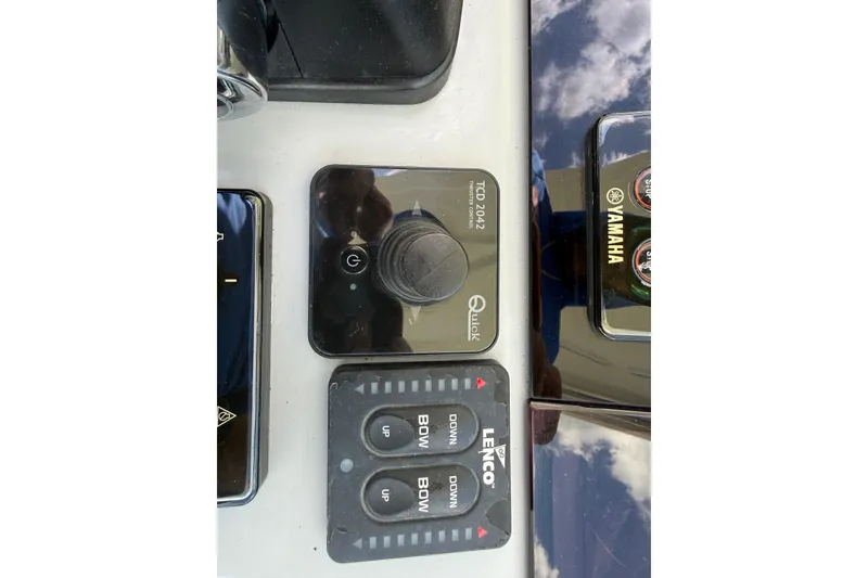 Slide: The Image of Control panel of a 2019 Jeanneau Leader 10.5 boat with Yamaha and Lenco systems. - 58