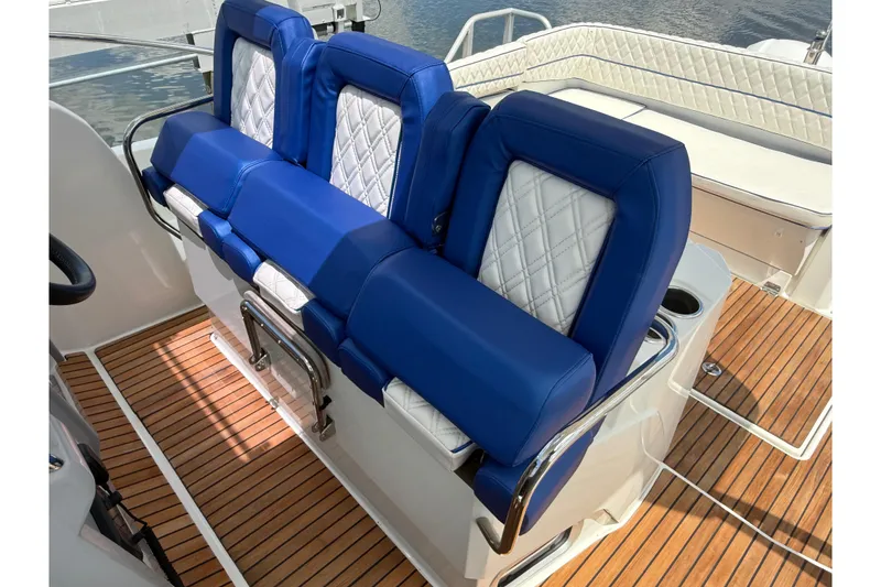 Slide: The Image of Luxurious blue and white seating on 2019 Jeanneau Leader 10.5 boat deck. - 71