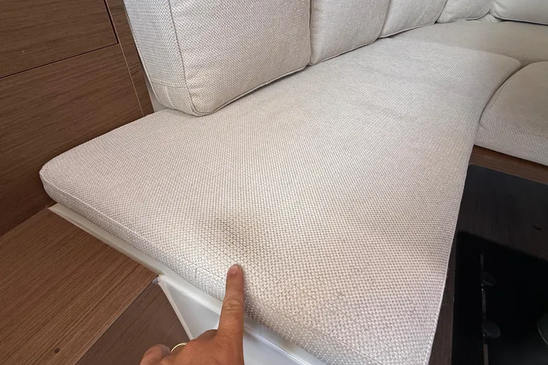 Slide: The Image of Cushion detail on 2019 Jeanneau Leader 10.5 boat, highlighting upholstery texture. - 84