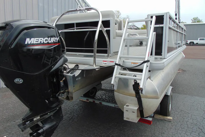 Slide: The Image of 2024 Godfrey Sweetwater 2086 C pontoon boat with Mercury outboard motor and ladder. - 8