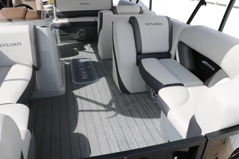 Slide: The Image of Interior of 2025 Sylvan MIRAGE X3 DLZ BAR pontoon boat with luxurious seating. - 10