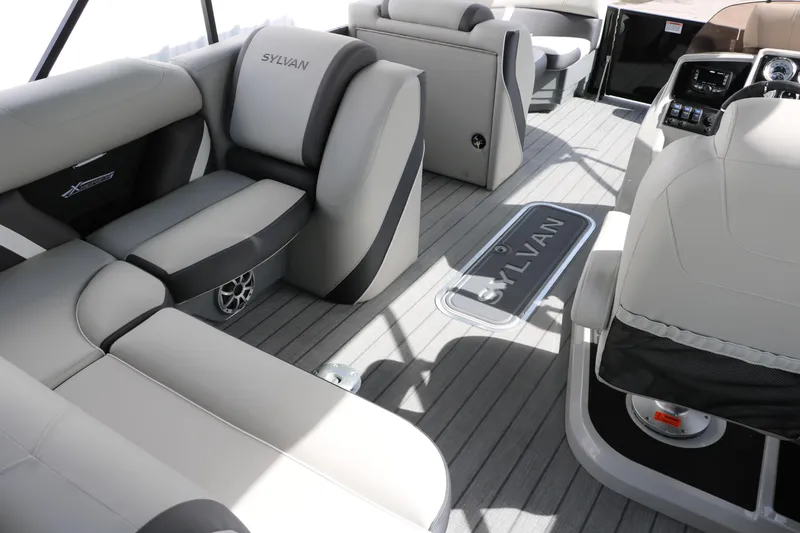 Slide: The Image of 2025 Sylvan MIRAGE X3 DLZ BAR boat interior with luxurious seating and modern design. - 20