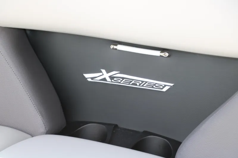 Slide: The Image of Interior of 2025 Sylvan MIRAGE X3 DLZ BAR, featuring X-Series branding. - 24