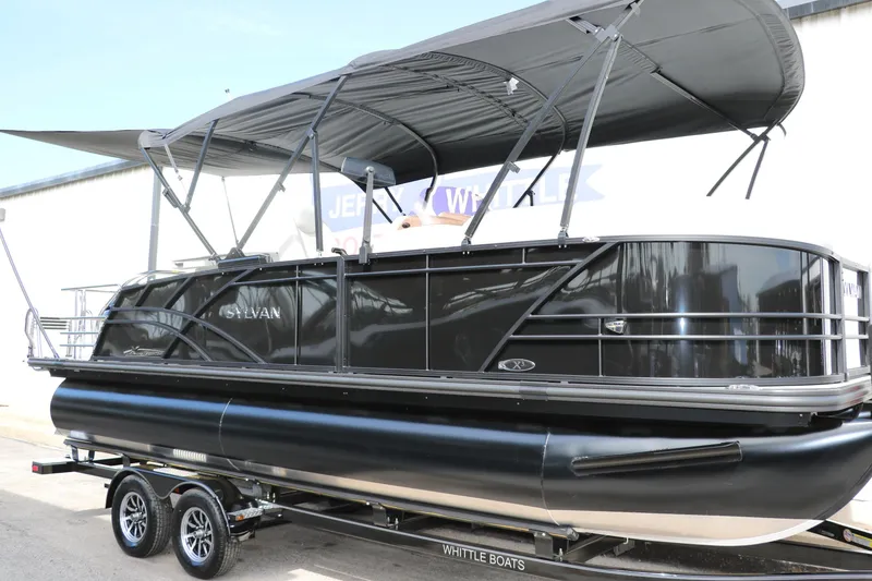 Slide: The Image of 2025 Sylvan MIRAGE X3 DLZ BAR pontoon boat with canopy on trailer. - 5