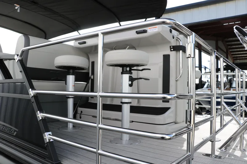 Slide: The Image of 2025 Sylvan MIRAGE X3 DLZ BAR pontoon boat with sleek bar seating and modern design. - 8