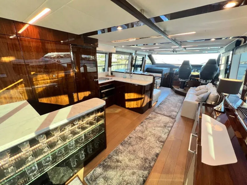 Slide: The Image of Luxurious interior of 2020 Fairline Squadron 68 yacht with modern design and elegant furnishings. - 13