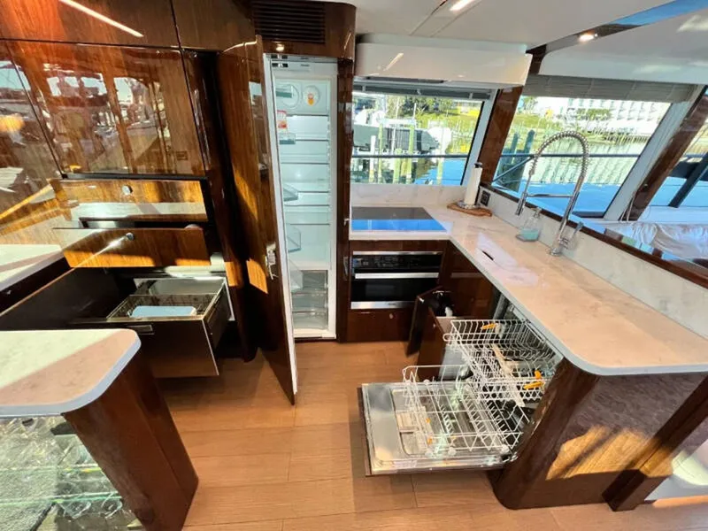 Slide: The Image of Luxurious kitchen interior of 2020 Fairline Squadron 68 yacht with modern appliances. - 16