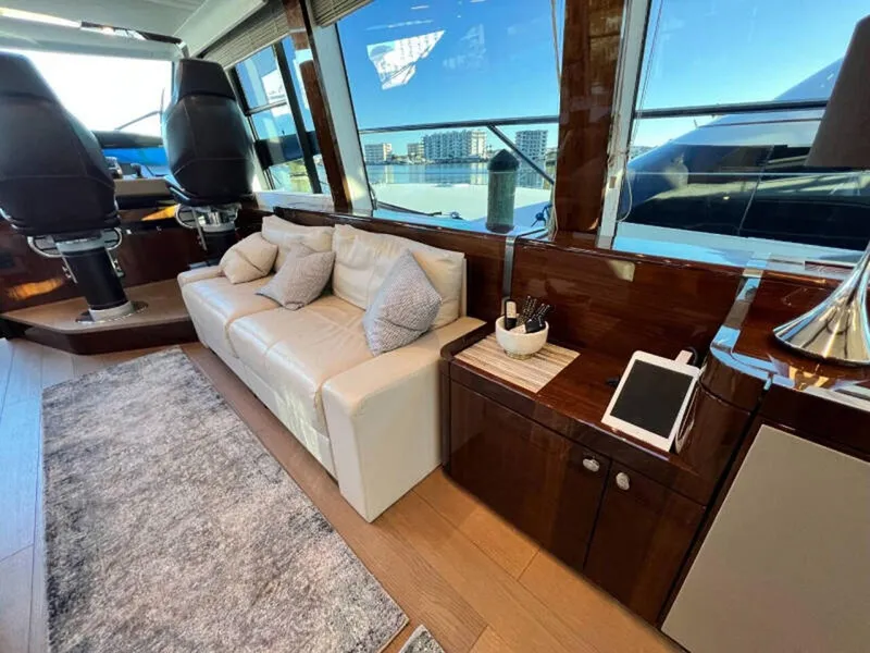 Slide: The Image of Luxurious interior of 2020 Fairline Squadron 68 yacht with leather sofa and modern decor. - 8