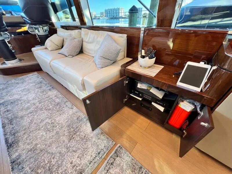 Slide: The Image of Luxurious interior of 2020 Fairline Squadron 68 yacht with sofa and modern amenities. - 9