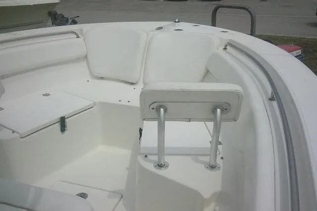 Slide: The Image of 2014 Sea Fox 226 Commander boat interior with white seating and railings. - 15