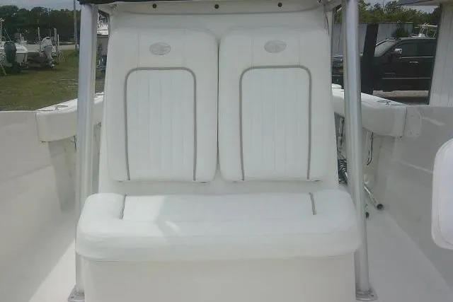 Slide: The Image of 2014 Sea Fox 226 Commander boat with white cushioned seating. - 18