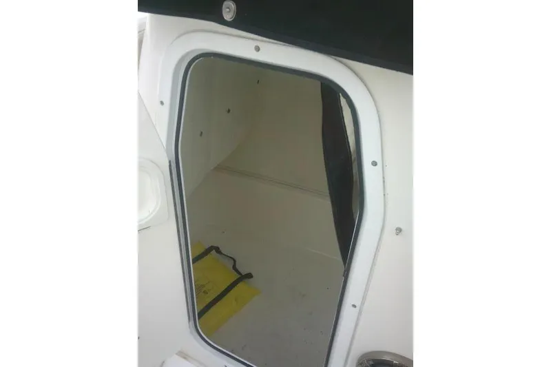 Slide: The Image of Cabin interior of 2014 Sea Fox 226 Commander boat, featuring a small enclosed space. - 22