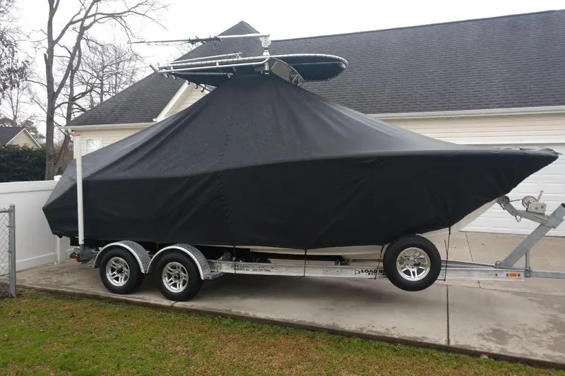 Slide: The Image of Covered 2014 Sea Fox 226 Commander boat on trailer in driveway. - 3