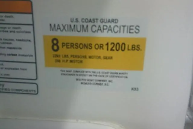 Slide: The Image of U.S. Coast Guard capacity label for 2014 Sea Fox 226 Commander: 8 persons or 1200 lbs. - 31