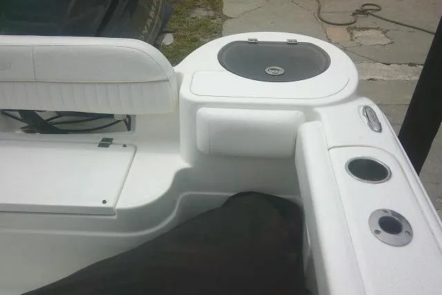 Slide: The Image of 2014 Sea Fox 226 Commander boat interior with seating and storage compartments. - 34