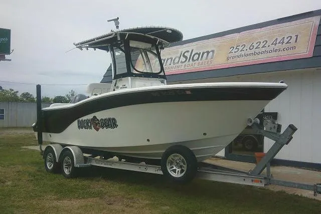 Slide: The Image of 2014 Sea Fox 226 Commander boat on trailer outside dealership. - 4