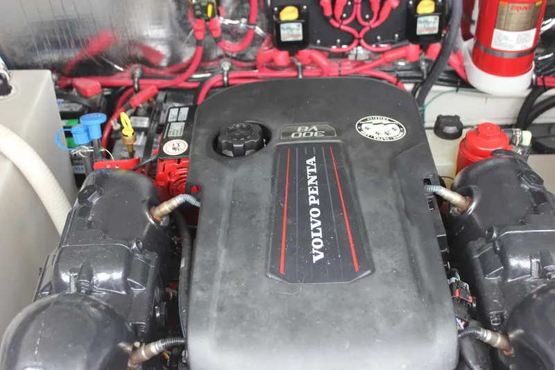 Slide: The Image of Volvo Penta engine in 2018 Regal 33 Express boat, showcasing wiring and components. - 15