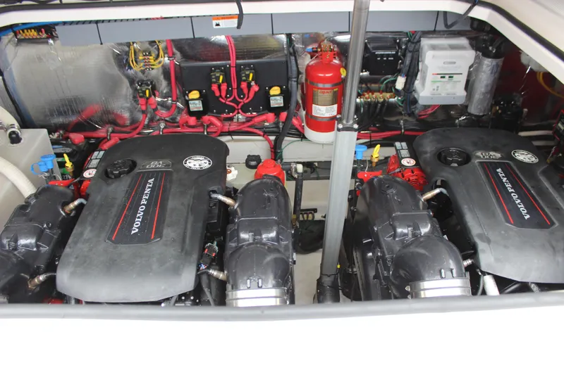 Slide: The Image of Engine compartment of a 2018 Regal 33 Express with Volvo Penta engines. - 18
