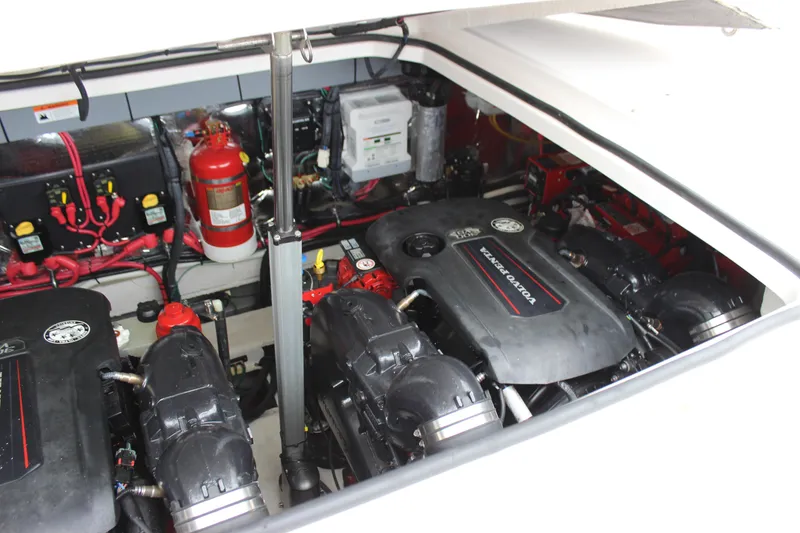 Slide: The Image of Engine compartment of a 2018 Regal 33 Express boat with Volvo Penta engines. - 19