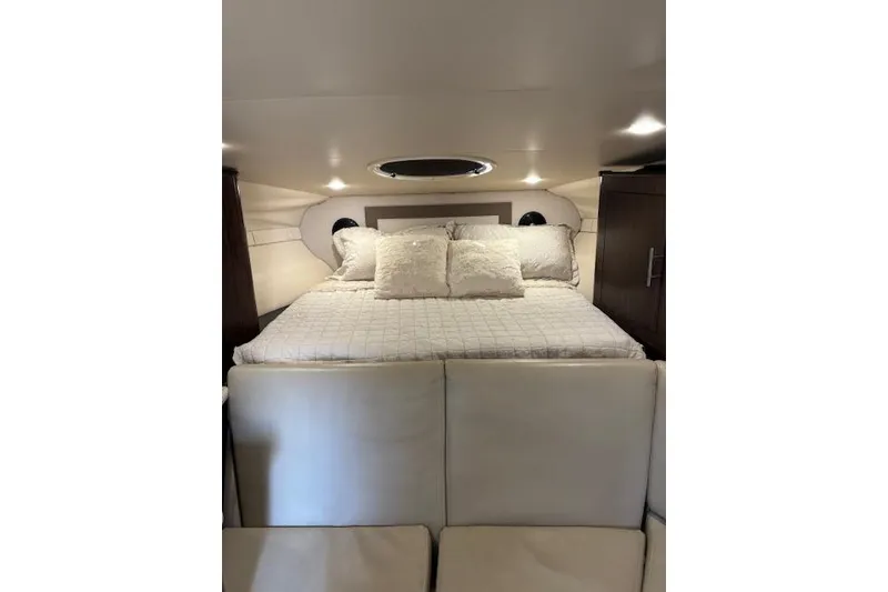 Slide: The Image of Luxurious interior cabin of 2018 Regal 33 Express yacht with cozy bed. - 34