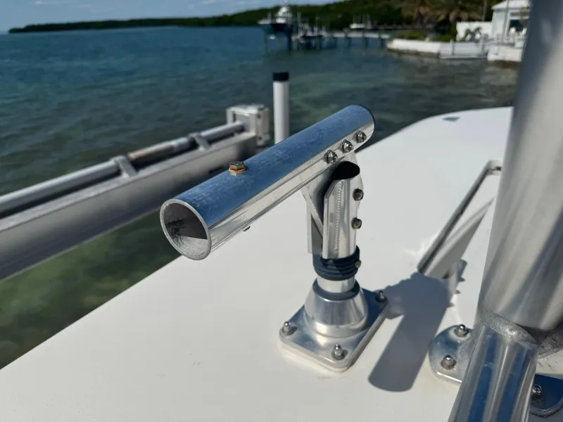 Slide: The Image of Rod holder on 2014 SeaVee 390B Center Console boat, docked by the water. - 35