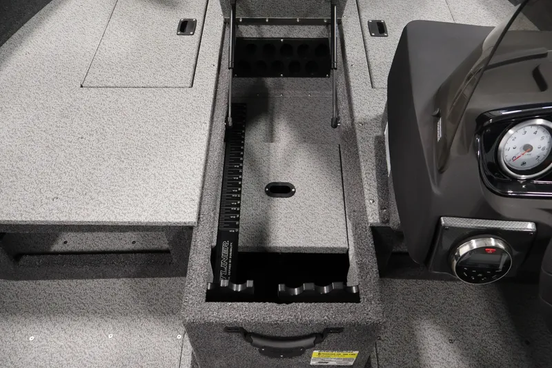 Slide: The Image of Interior of 2027 Crestliner 1650 HAWK SC boat showing storage and dashboard features. - 23