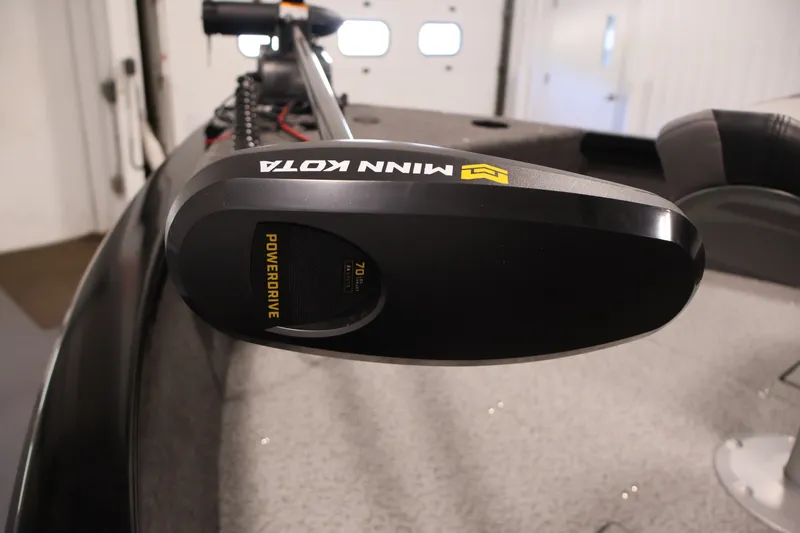 Slide: The Image of Minn Kota PowerDrive motor on 2027 Crestliner 1650 HAWK SC boat, indoor setting. - 16