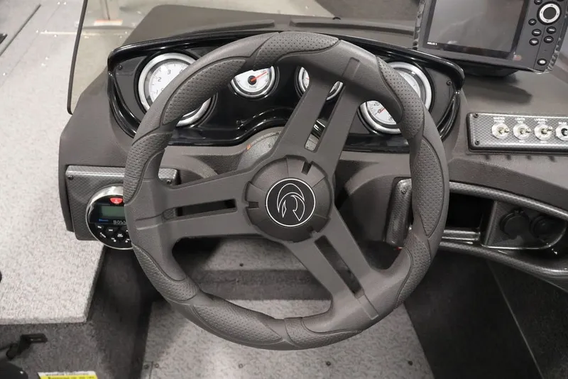Slide: The Image of Steering wheel and dashboard of 2027 Crestliner 1650 Hawk SC boat. - 23