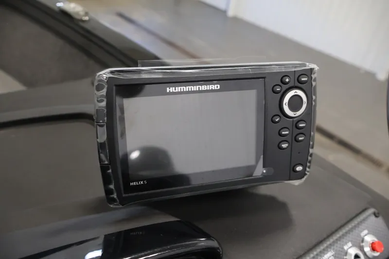 Slide: The Image of Humminbird Helix 5 fish finder on 2027 Crestliner 1650 HAWK SC boat dashboard. - 29