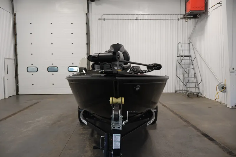 Slide: The Image of 2027 Crestliner 1650 HAWK SC boat in a garage, front view. - 6