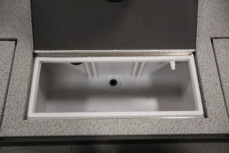 Slide: The Image of Open storage compartment in 2027 Crestliner 1650 Hawk SC boat. - 44