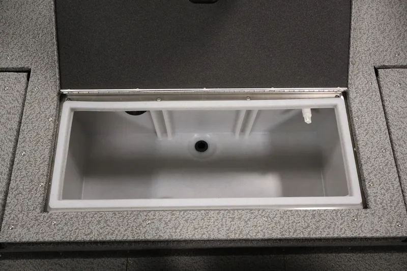 Slide: The Image of 2027 Crestliner 1650 HAWK SC boat livewell, open lid, gray interior. - 38
