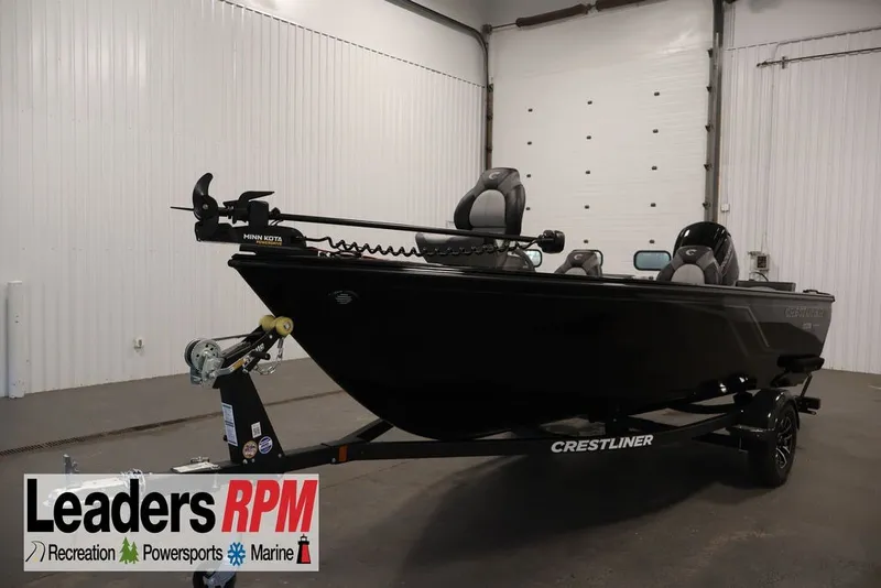 The Image of 2027 Crestliner 1650 Hawk SC fishing boat in showroom, featuring Minn Kota trolling motor. - 6