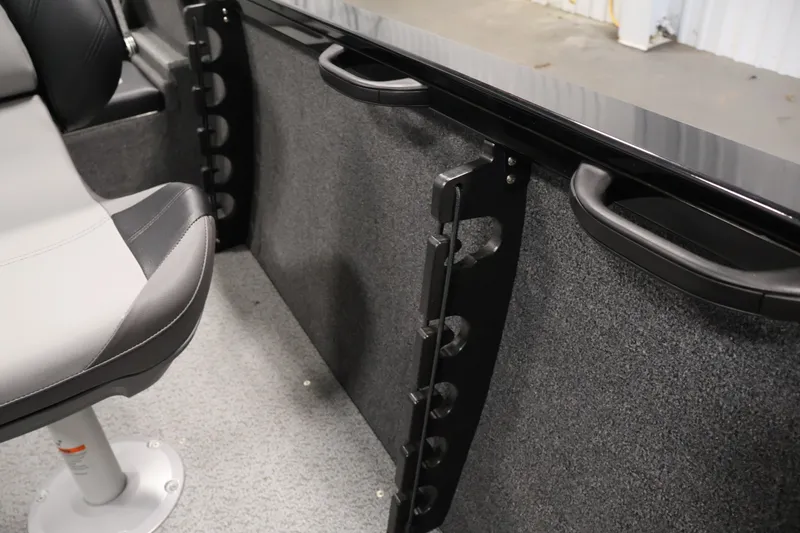 Slide: The Image of Interior of 2027 Crestliner 1650 HAWK SC boat showing seating and storage features. - 33