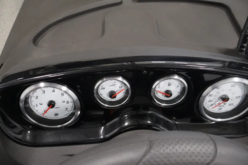 Slide: The Image of Dashboard of 2027 Crestliner 1650 HAWK SC boat with gauges and controls. - 28