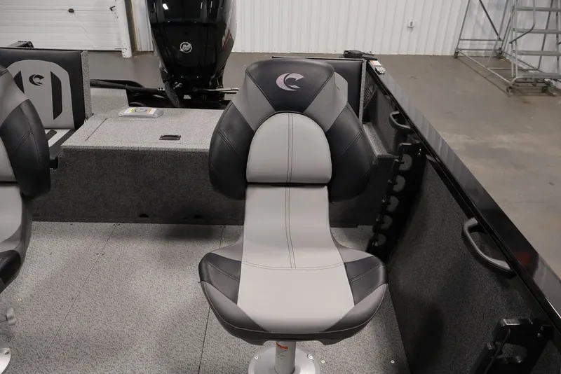 Slide: The Image of 2027 Crestliner 1650 Hawk SC boat interior with gray and black seating. - 40