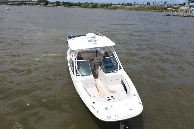 Slide: The Image of 2017 Boston Whaler 270 Vantage showing off large bow seating area w/massive storage, anchor locker, drink holders & more - 4