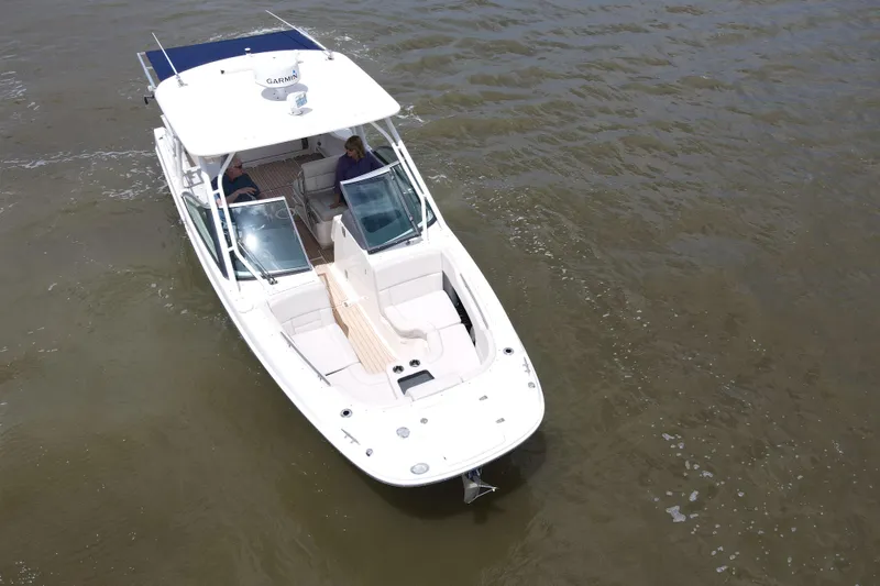 Slide: The Image of 2017 Boston Whaler 270 Vantage boat cruising on open water, aerial view. - 7