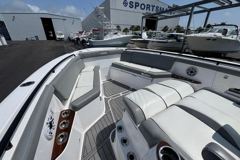 Slide: The Image of 2022 Everglades 395 Center Console boat interior with luxurious seating and modern design. - 15