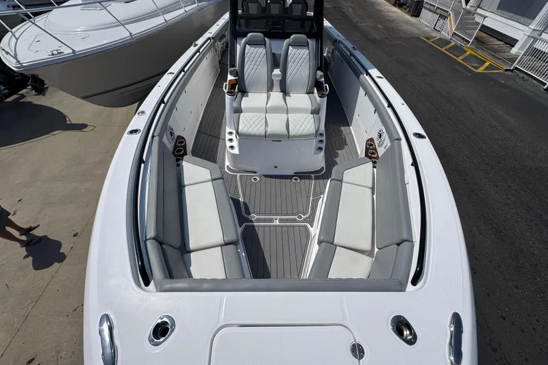 Slide: The Image of 2022 Everglades 395 Center Console boat with spacious seating and sleek design. - 16
