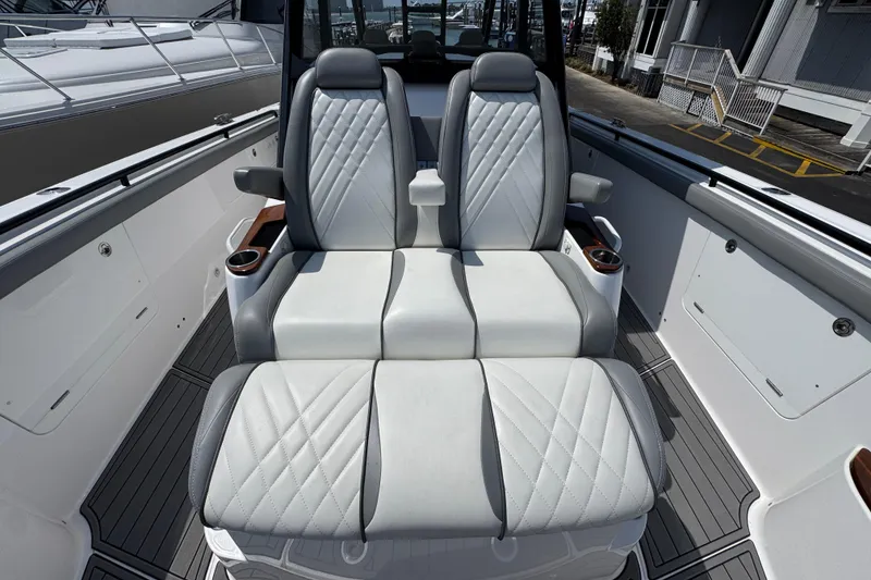 Slide: The Image of Luxury seating on 2022 Everglades 395 Center Console boat, featuring elegant design and comfort. - 19