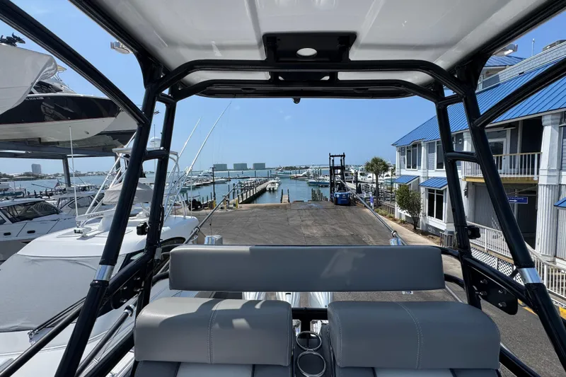 Slide: The Image of 2022 Everglades 395 Center Console at marina with waterfront view. - 39