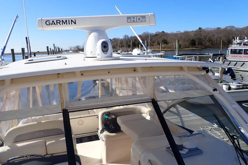 Slide: The Image of 2016 Grady-White Freedom 335 boat with Garmin xHD2 radar at dock. - 10