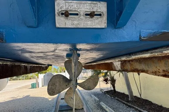 Slide: The Image of Propeller of a 1996 Island Hopper Forward Cabin Dive Boat on a trailer. - 8