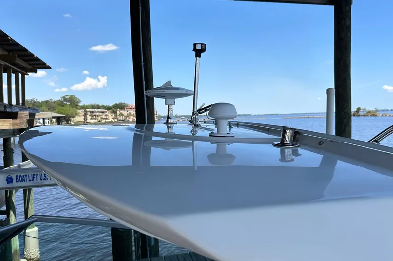 Slide: The Image of 2014 Monterey 260 Sport Yacht on water, showcasing sleek design and modern equipment. - 17