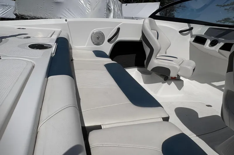 Slide: The Image of Interior of 2022 Tahoe 185 S boat with white and gray seating. - 7