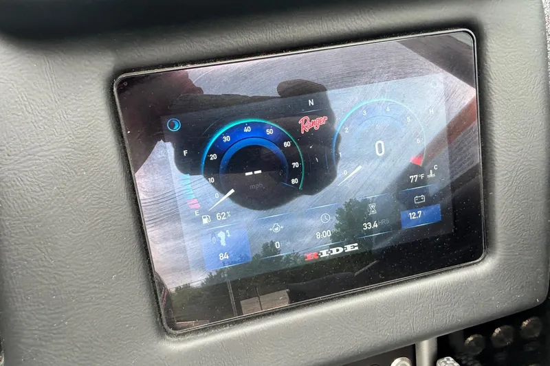 Slide: The Image of 2023 Ranger VX1888 WT dashboard display showing speedometer and fuel gauge. - 10