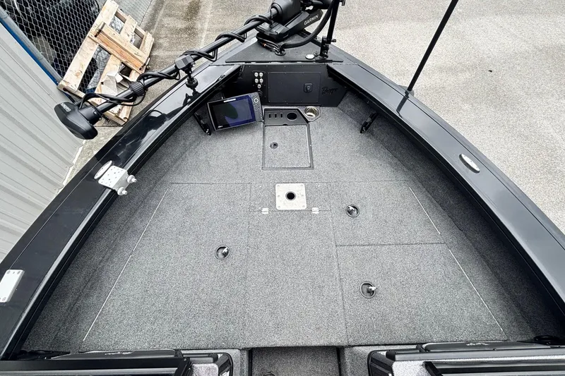 Slide: The Image of 2023 Ranger VX1888 WT boat deck with Garmin equipment and storage compartments. - 5