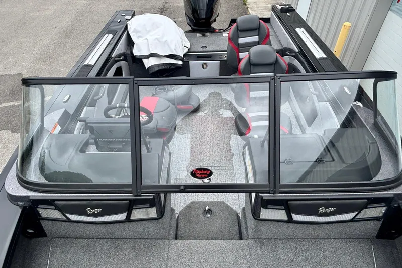 Slide: The Image of 2023 Ranger VX1888 WT boat interior with seating and steering console. - 8